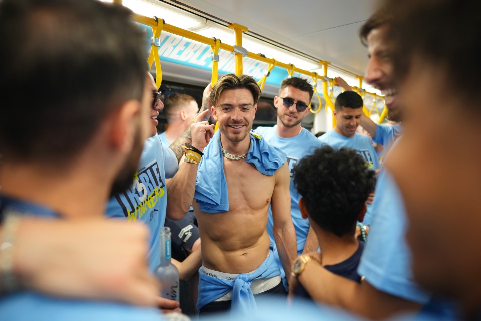 A topless Grealish made his way to the parade on the tram