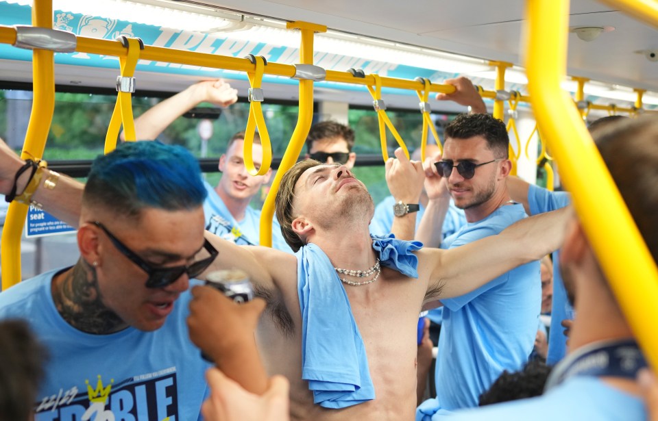 Jack and the team on a tram before their bus parade at 6.50pm on Monday