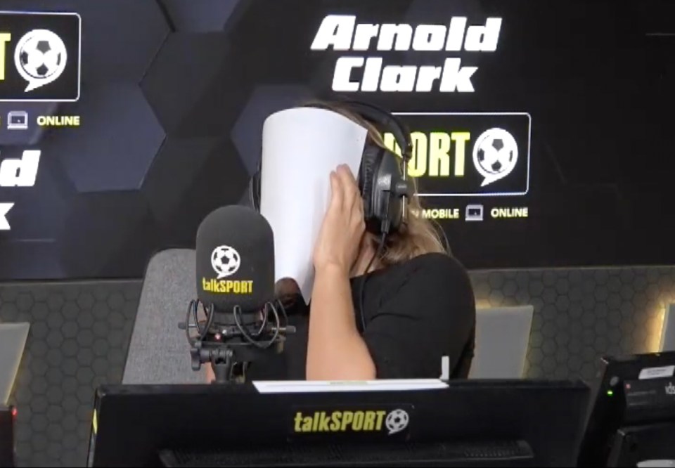 The presenter hid her tears behind a piece of paper