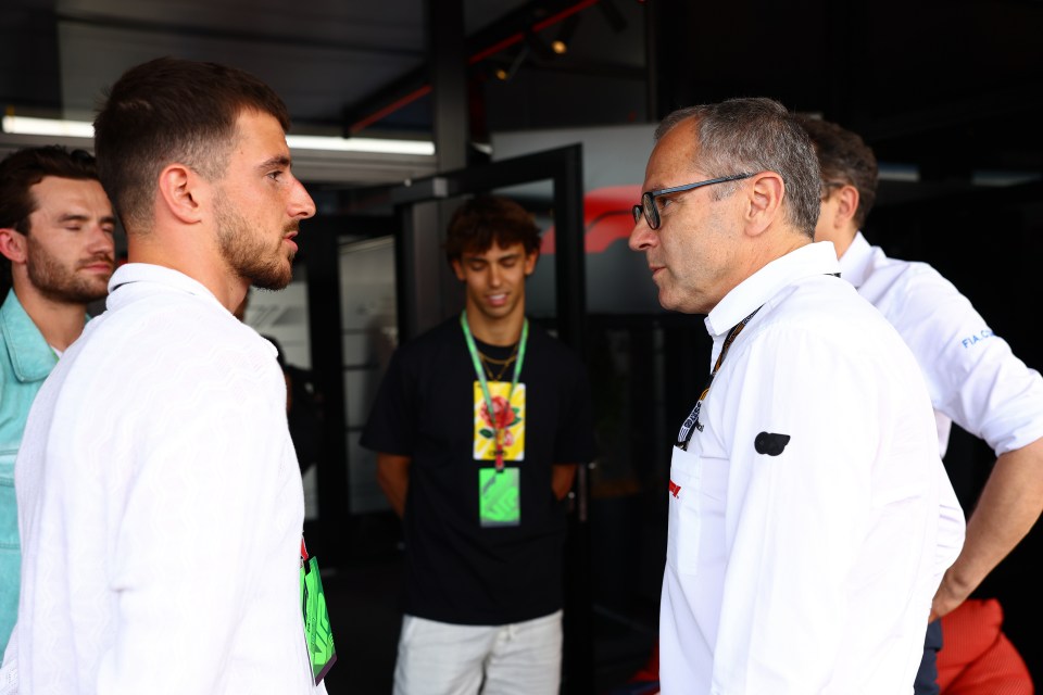 The Chelsea star, pictured with F1 chief Stefano Domenicali, looks set to join Man Utd