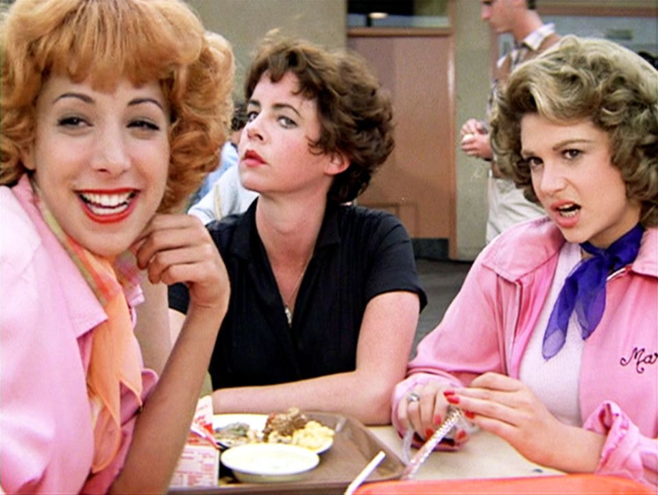 Stockard Channing, centre, was in her early 30s when she played High School student and leader of the Pink Ladies, Rizzo