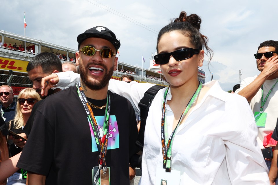 Neymar poses with singer Rosalia at the Spanish GP