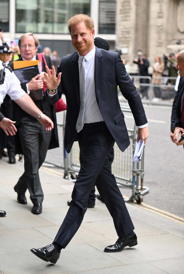 Prince Harry arrives for the second day of the phone hacking trial