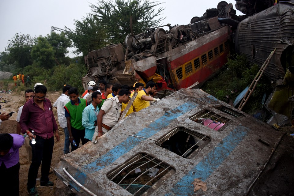 Desperate workers search for survivors under the rubble