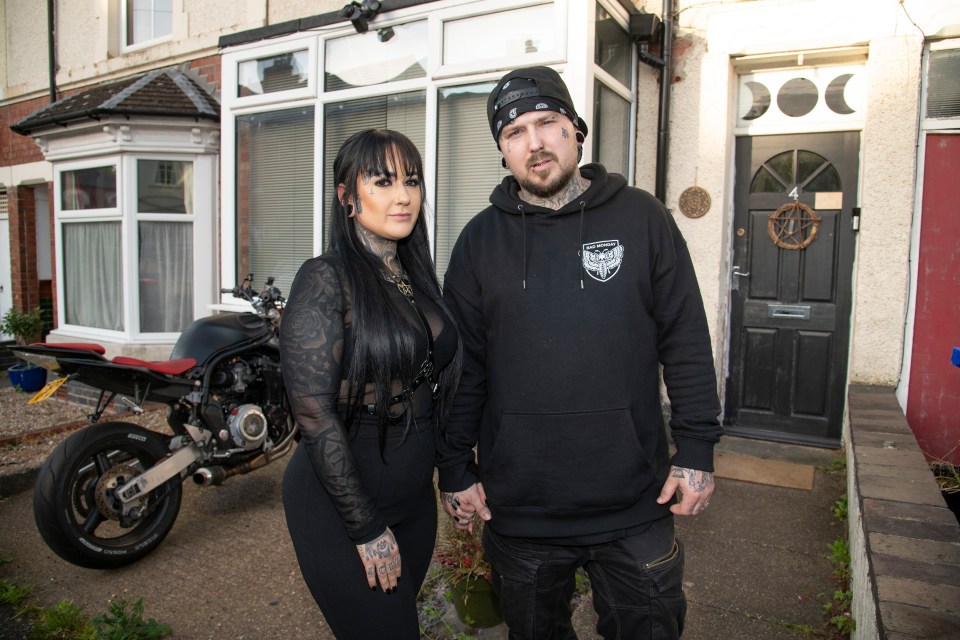 Samantha and Rich Perry outside their formerly 'haunted' home in Staffordshire