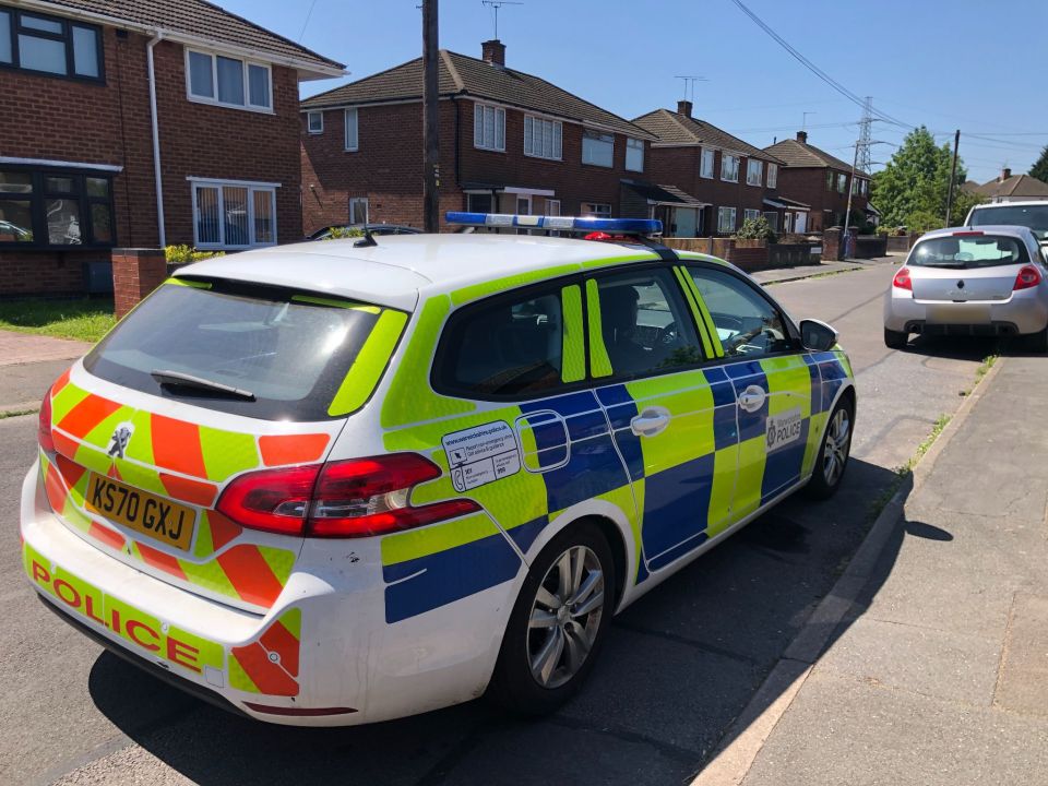 Police at the scene in Bedworth, Warwickshire