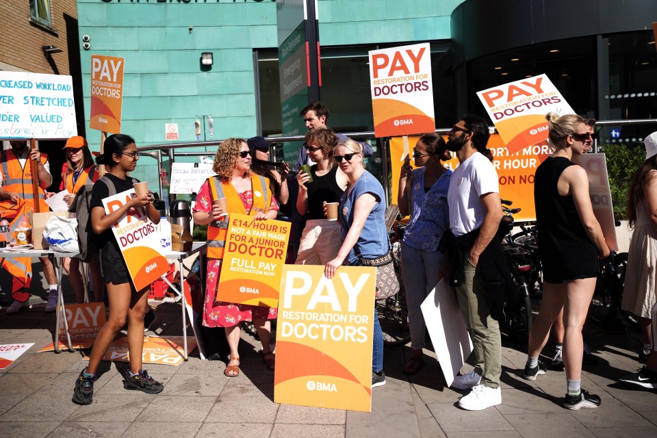 Striking junior doctors on the picket line outside Bristol Royal Infirmary in June