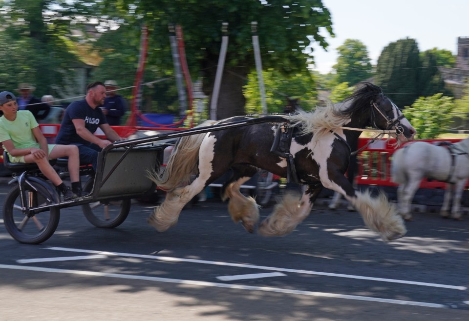 Travellers rode their horses along country roads