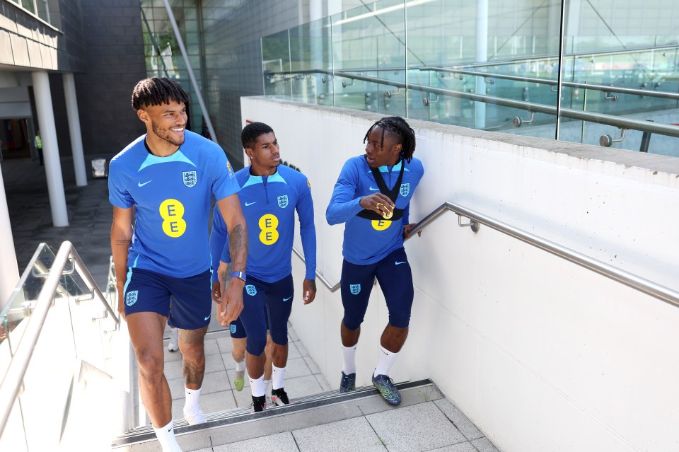 Tyrone Mings, Marcus Rashford and new boy Eberechi Eze walk out for a training session at St Georges Park in Burton on Thursday