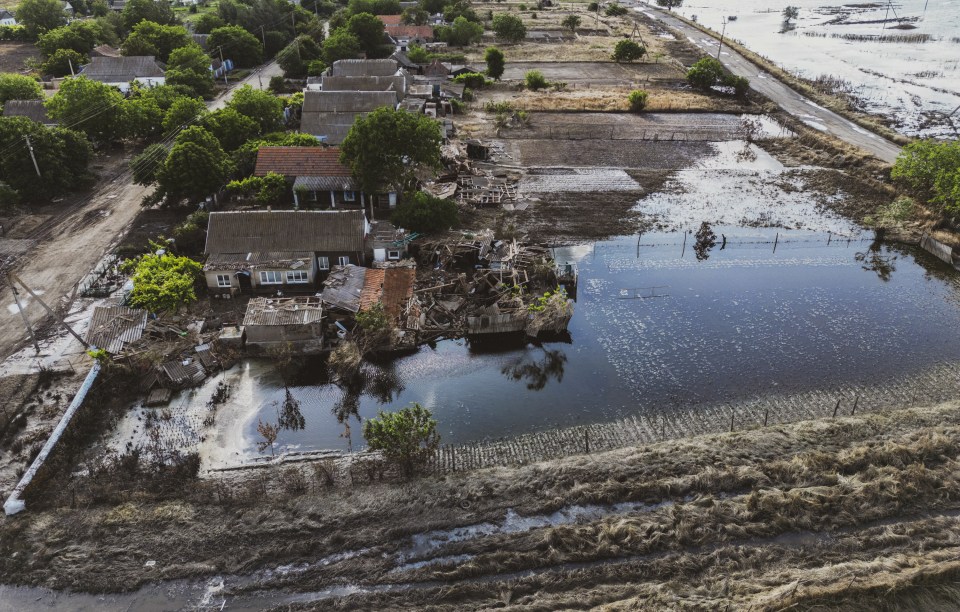 An aerial view of damaged houses after flooding in Mykolaiv