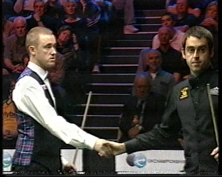 O'Sullivan shakes hands with a shocked Stephen Hendry before storming out of the match.