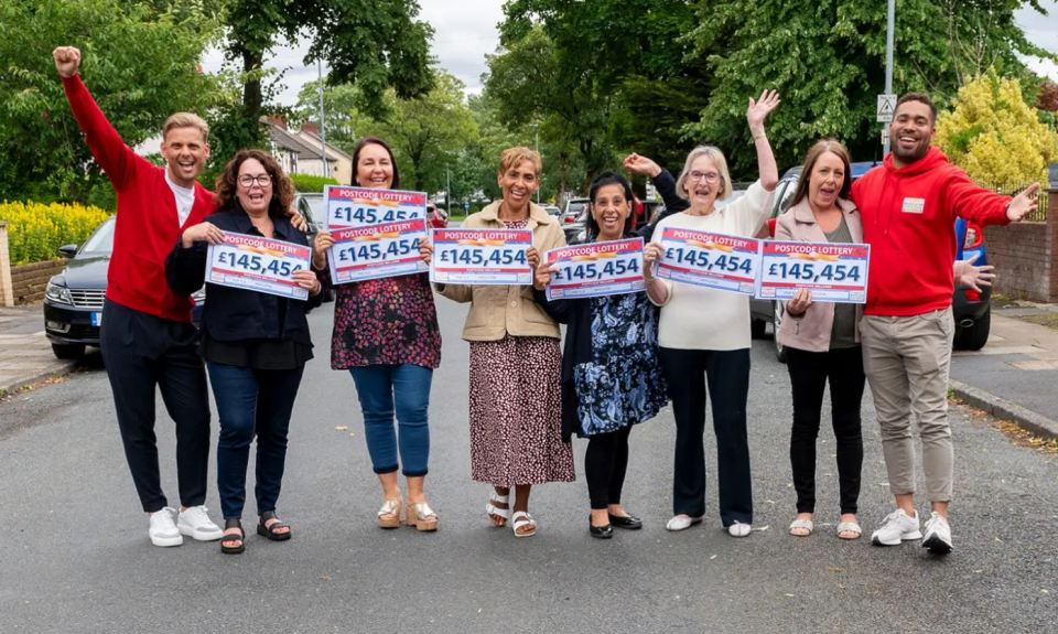 A group of neighbours in Manchester took home a giant lottery win