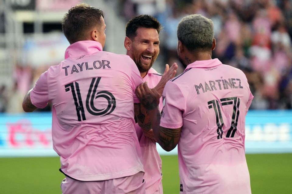 Messi celebrates with his new team-mates