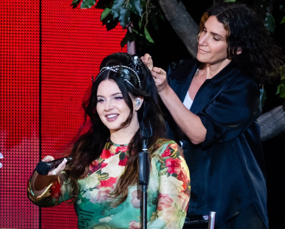 The singer has her hair done on stage as part of her set