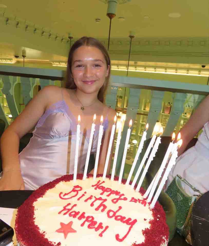 She blew the candles out on a personalised red velvet cake