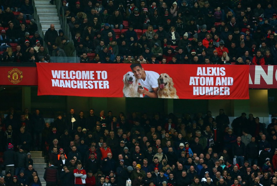 Manchester United fans created a banner with the pooches on