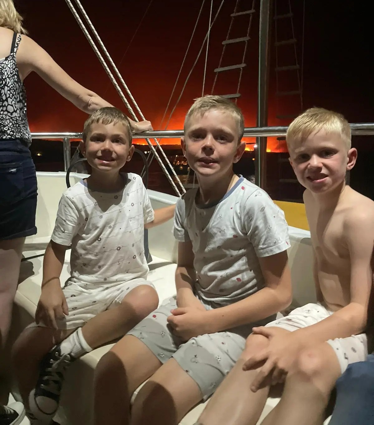 Daniel Jones' three brave sons after they had waded through deep water and clambered onto a private boat