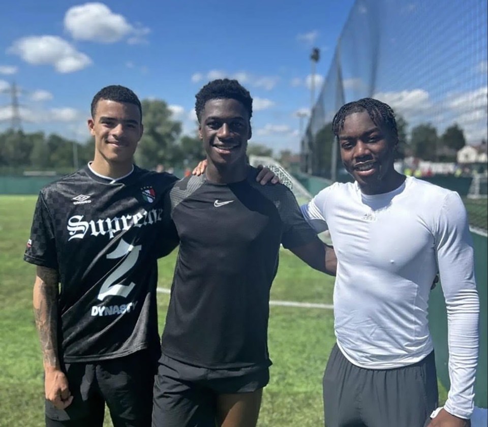 Mason Greenwood, left, keeps in tip-top condition with Manchester United teammate Anthony Elanga, right, with Irish star James Abankwah between them