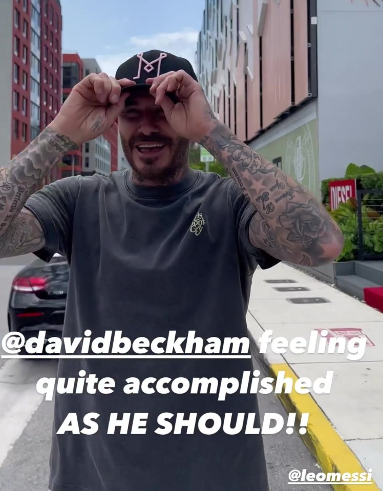 Man Utd and England legend Beckham caps off the job with a grin