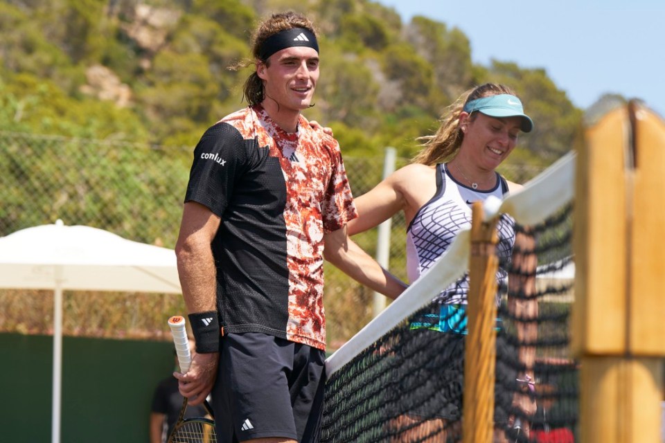 Stefanos Tsitsipas and Paula Badosa during a practice session