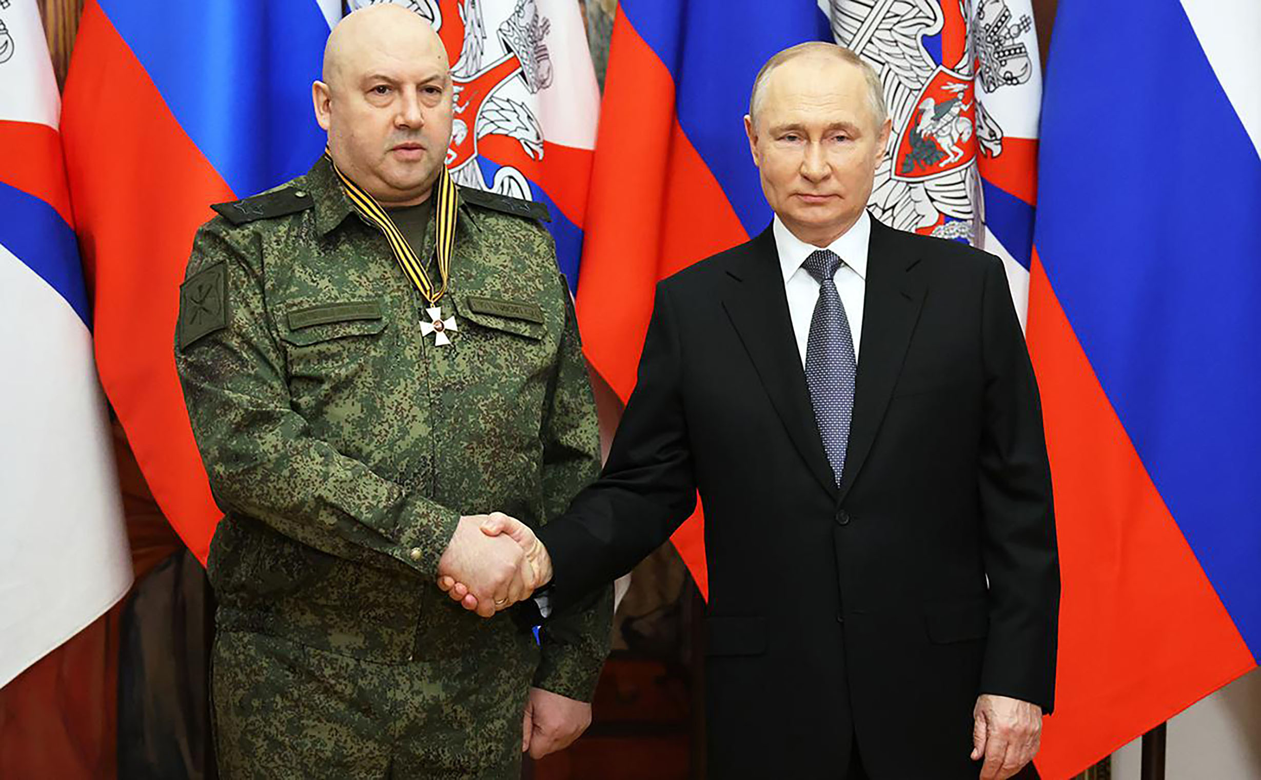 Putin back in happier days with his 'General Armageddon' who has vanished for over two weeks