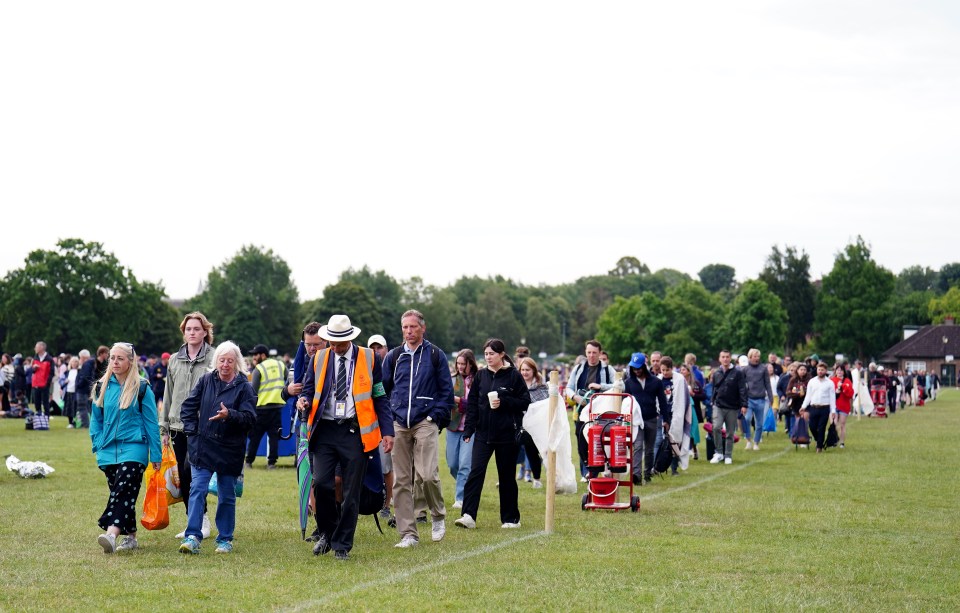 Queues for the tournament stretch past local homes