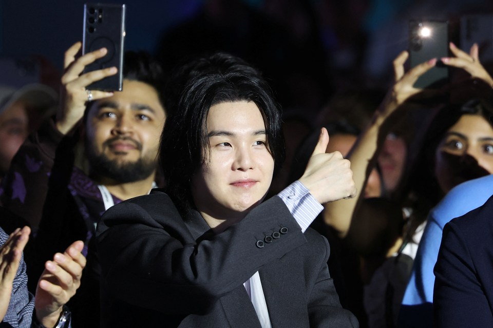 K-pop boy band BTS member Suga attends Samsung Galaxy Unpacked 2023 in Seoul, South Korea, July 26, 2023. REUTERS/Kim Hong-Ji