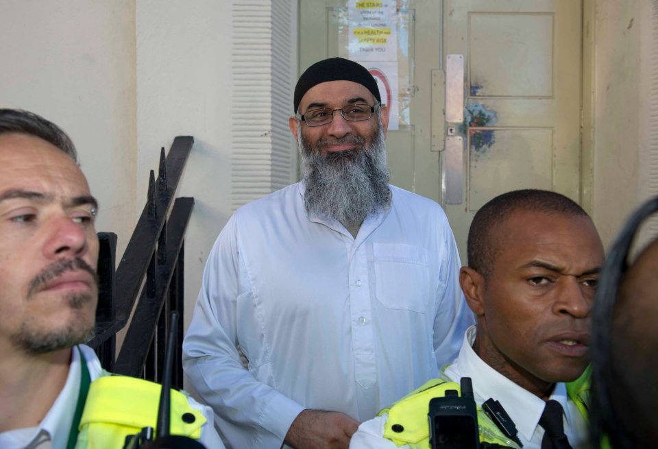 ISLAMIST HATE PREACHER ANJEM CHOUDARY GREETS MEDIA OUTSIDE HIS NORTH LONDON BAILK HOSTEL. Pic By Simon Jones