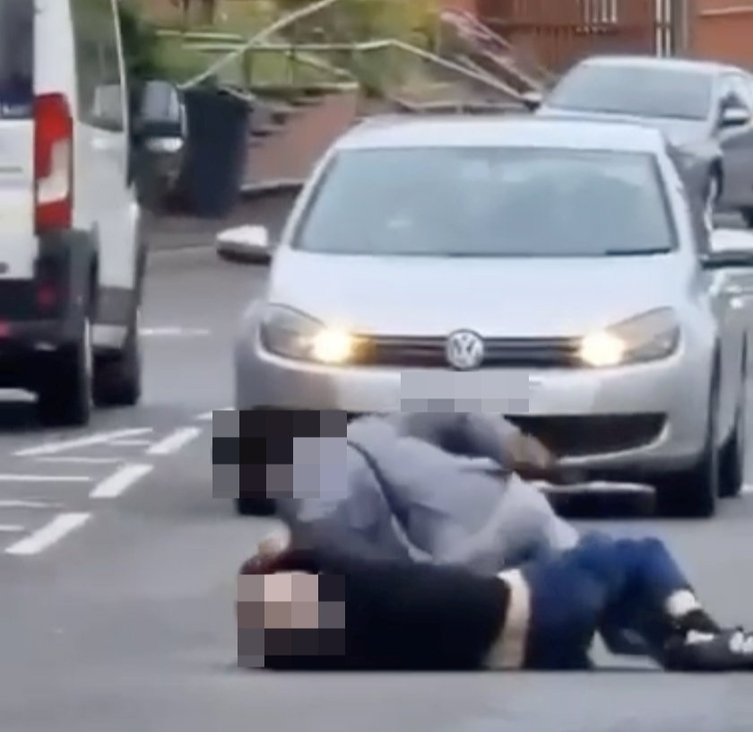 Two men were seen grappling in the middle of the road on the UK's 'roughest street'