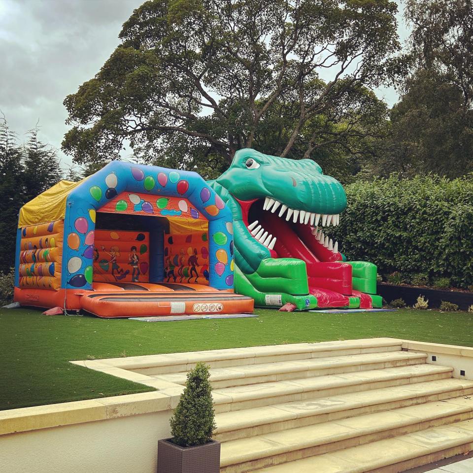 Penelope and Leo each had their own inflatable bouncy castle in Paddy and Christine's impressive garden