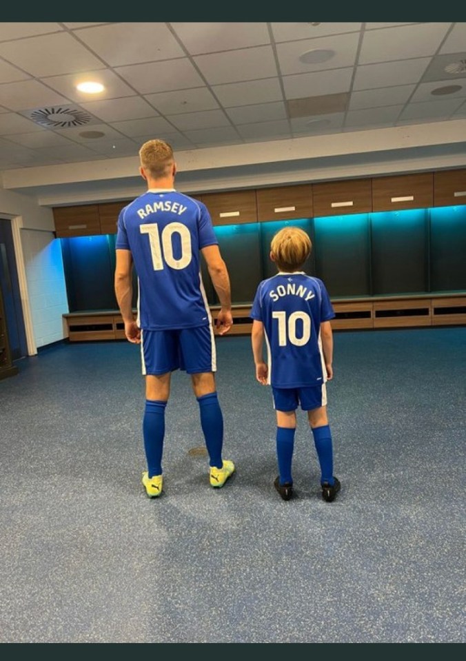 Aaron Ramsey is joined by his eldest boy Sonny in the Cardiff dressing room after the duo sign for the Welsh club