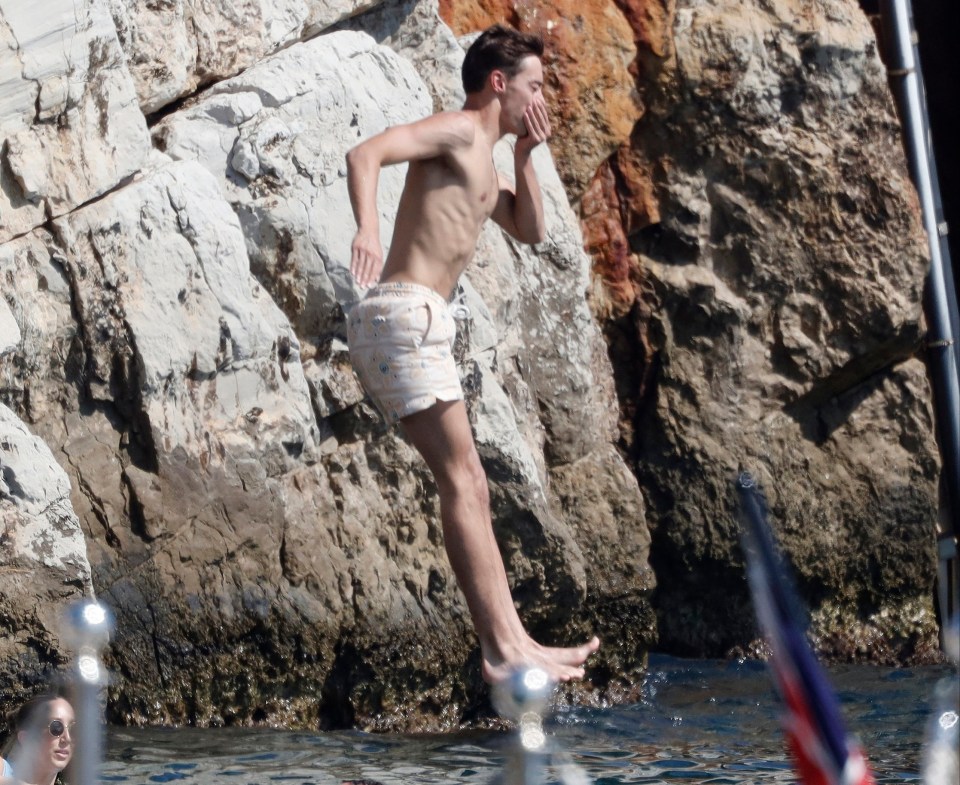 The pair took part in some cliff jumping off a diving board