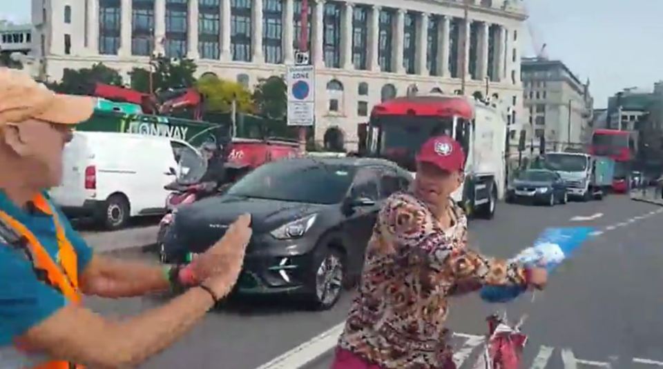 The protester told the skateboarder to take a 'deep breath'