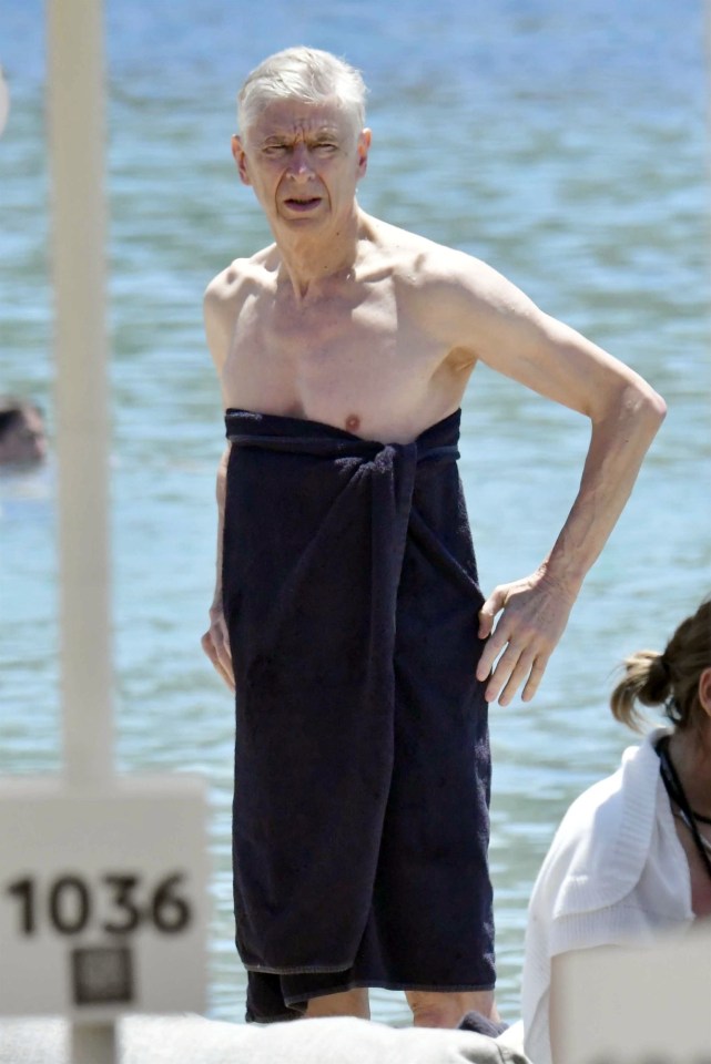 Wenger wrapped a towel around himself after his swim