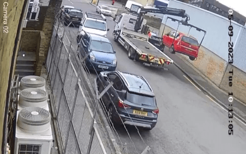 CCTV footage showed James' car being lifted for double yellow lines to be painted