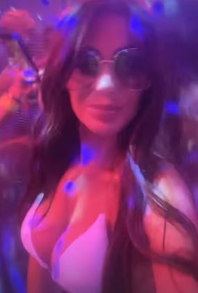 Chloe partied and did shots in the white swimwear