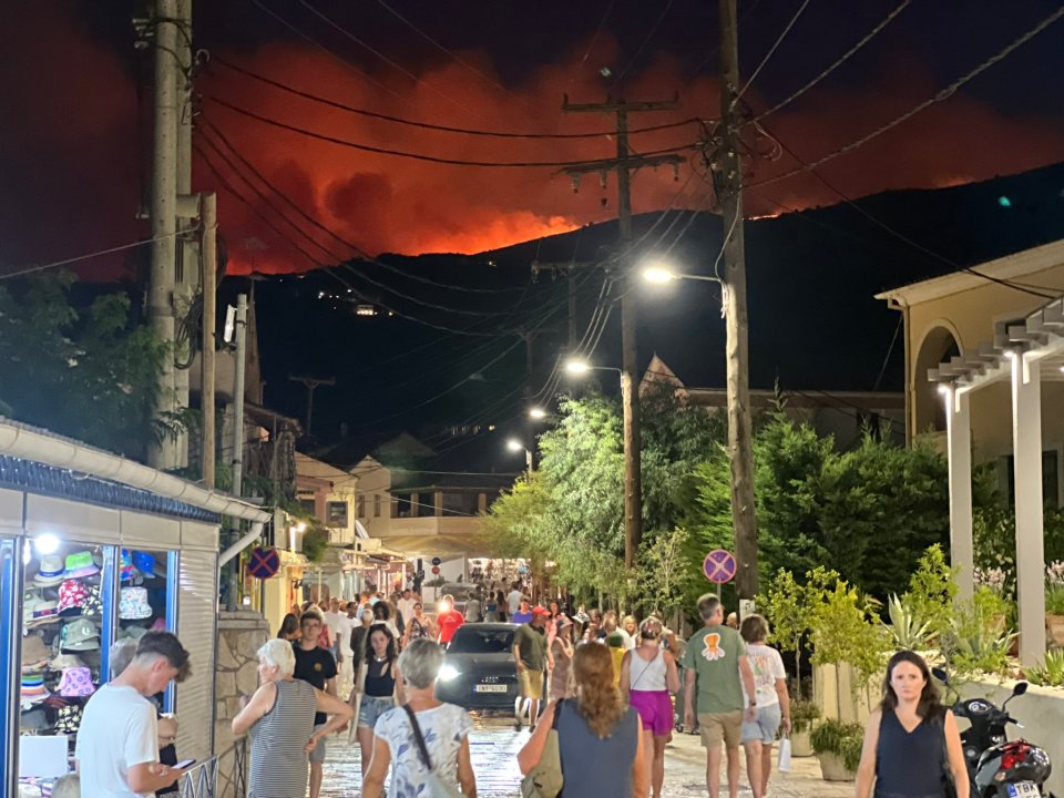 Thousands in Corfu were forced to evacuate by boat at Nissaki Beach