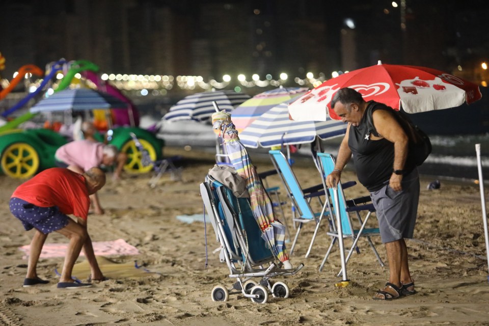 Benidorm locals were spotted setting up their sunbeds during the night