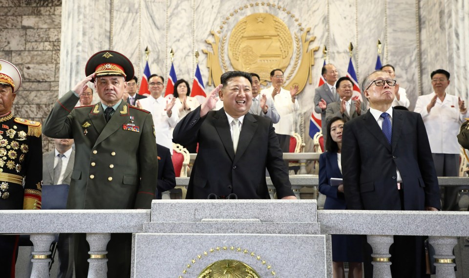 Kim Jong-un watched on beside Russia's Sergei Shoigu, left and China's Li Hongzhong, right