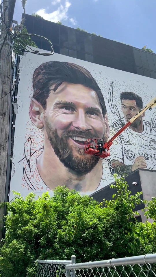 David Beckham climbed a mountain to sign Lionel Messi and has now clambered up on a crane to help paint this mural of Inter Miami's iconic new signing