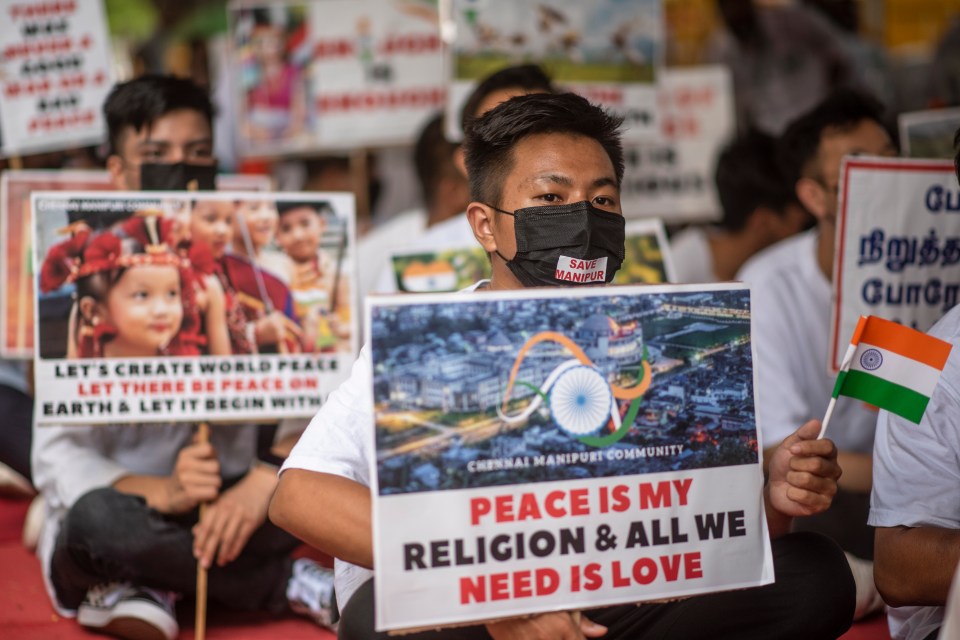 Protesters are demanding peace in the area that has been divided by warring ethnic factions