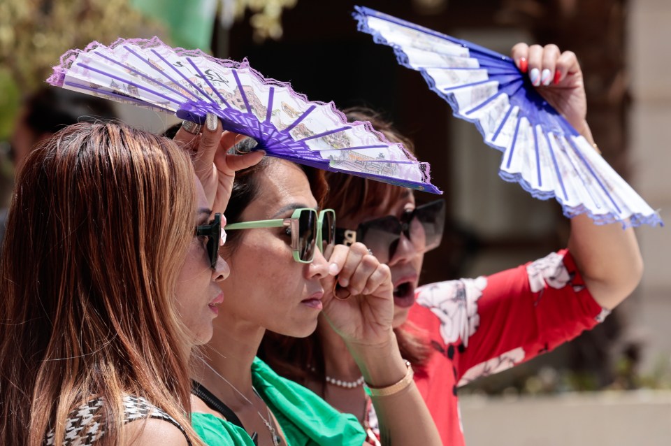 Tourists are fainting from the stifling heat