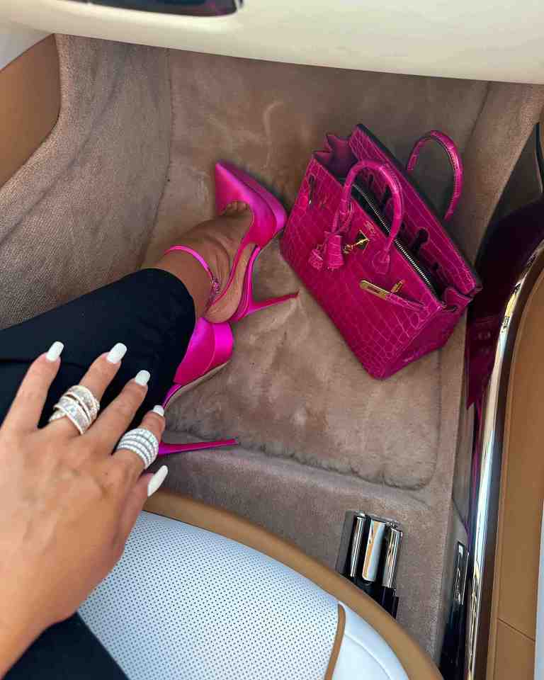 She showed off her nails, high heels and bag in one of the photos