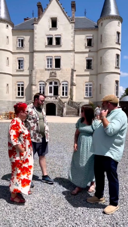 Dick and Angel outside the Chateau with newly engaged couple