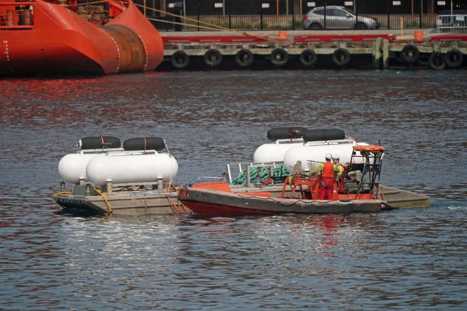 The platform used for the Titan submersible being towed at the Port of St. John’s in Newfoundland