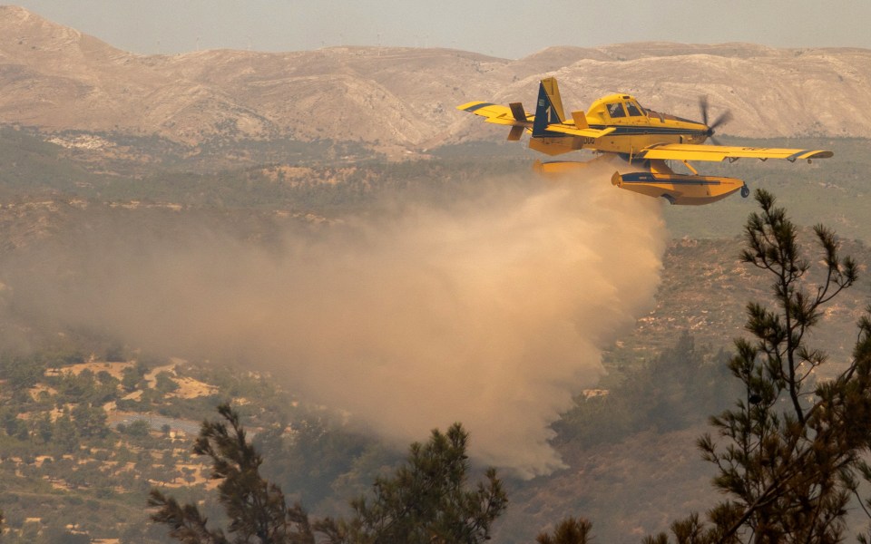 Aircraft using water bombs are struggling to control the blaze