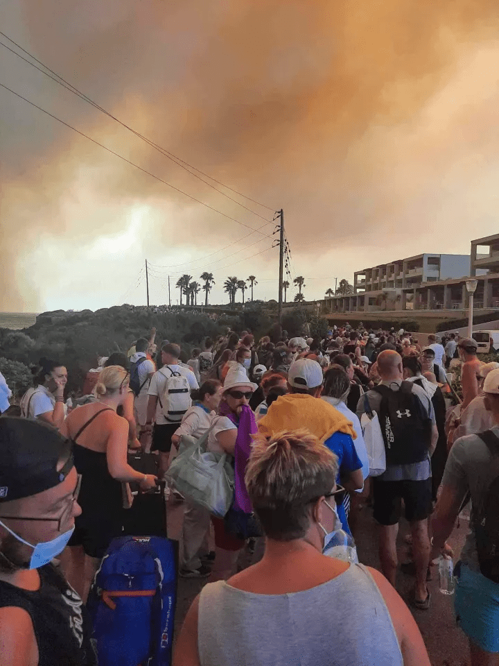 Thousands of tourists have been forced to flee as the fires sweep Rhodes