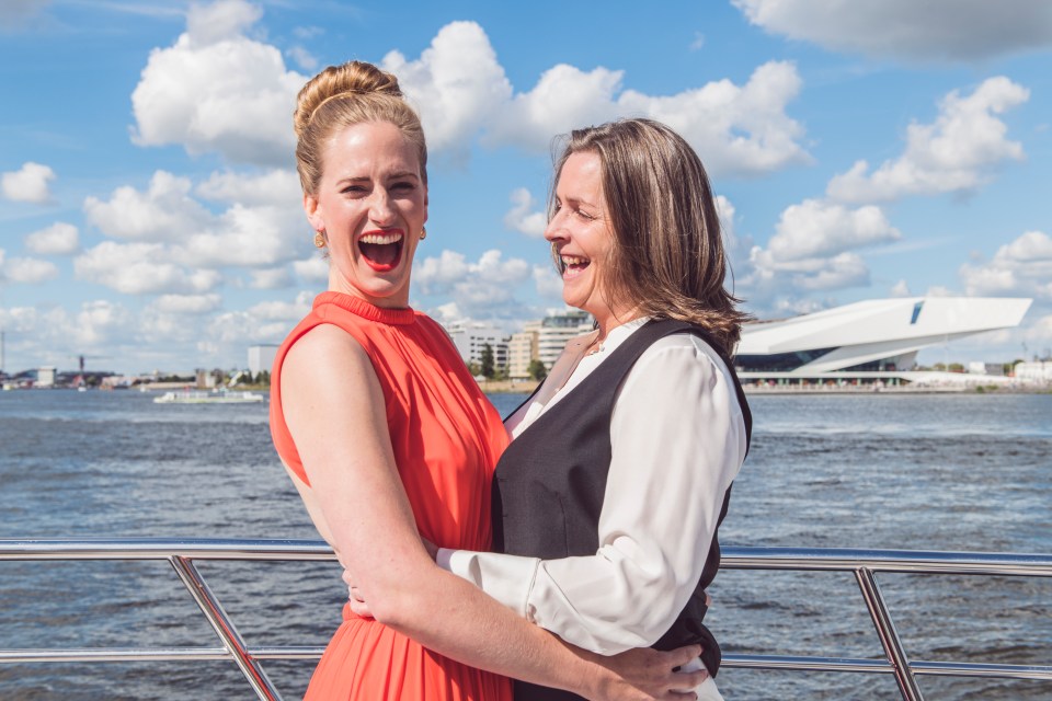 The couple hosted their wedding reception on a boat in Amsterdam