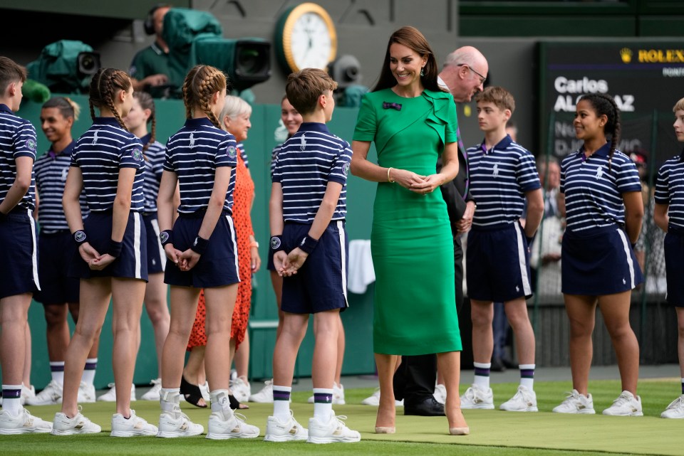 Princess Kate greeted the ballboys and ballgirls as she arrived for the presentation ceremony on Centre Court