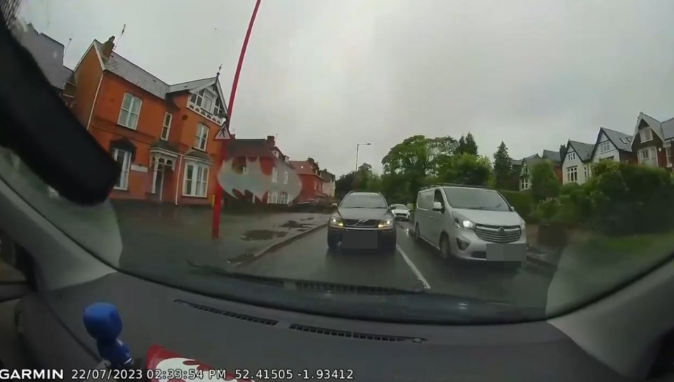 The Volvo driver was forced to reverse back after trying to overtake a long queue of cars